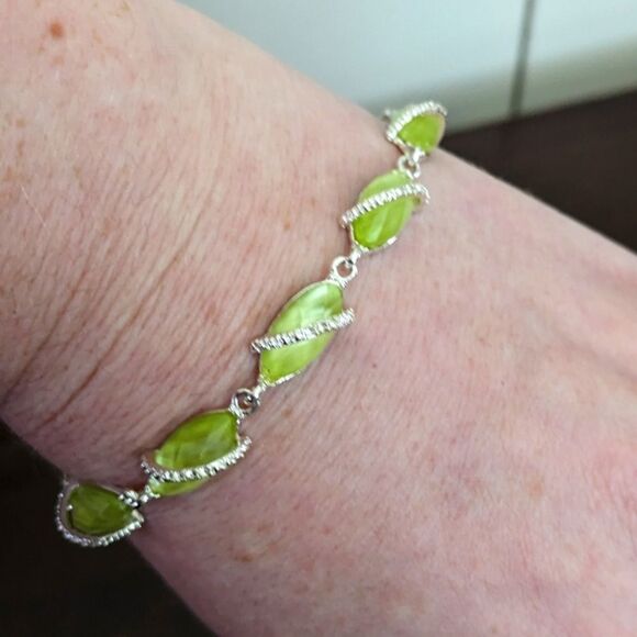 Avon Faux Citrine and Cubic Zirconia Silvertone Tennis Bracelet with Expander - Picture 2 of 9